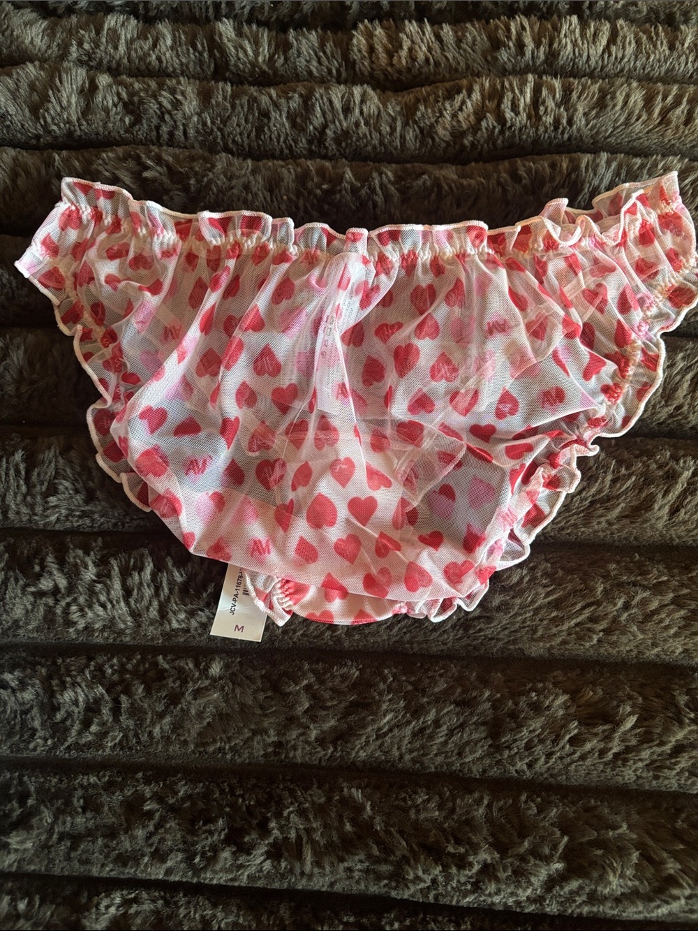 Adore Me Sheer Pink Bikini Brief with Red Heart Print and Ruffles - Picture 2 of 3